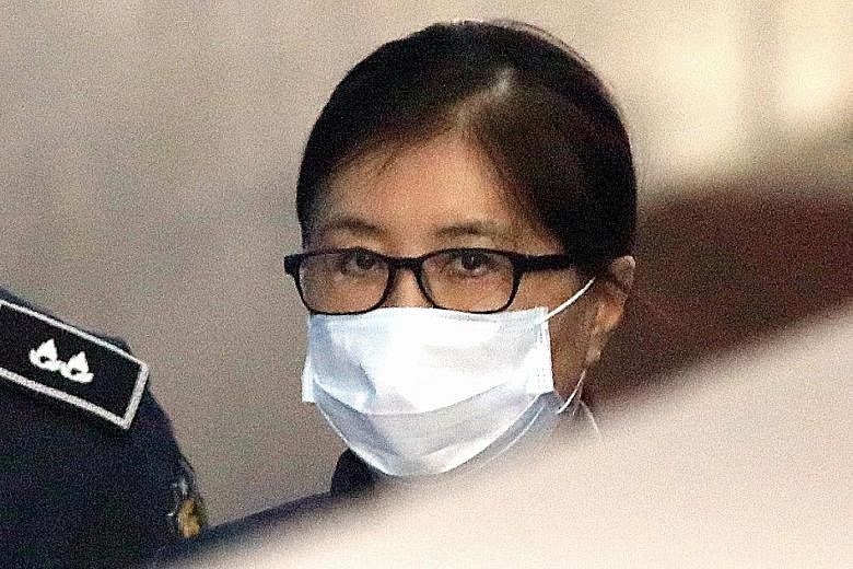Choi Soon Sil arriving at the Seoul Central District Court yesterday. She is accused of colluding with ousted president Park Geun Hye to extort millions from conglomerates and using her links with Park to meddle in state affairs.