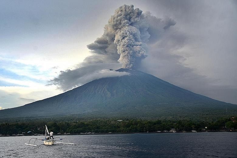 Bali's Mount Agung volcano began belching thick plumes of smoke and ash last month, causing flights to be cancelled and leaving thousands of tourists stranded.