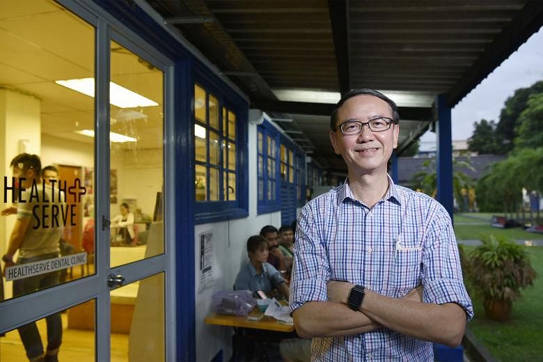 Dr Goh Wei Leong outside the HealthServe clinic at 1 Lorong 23, Geylang. The non-governmental organisation has dental and medical clinics in Geylang, Mandai and Jurong catering to migrant workers. It also provides social assistance to those in distre