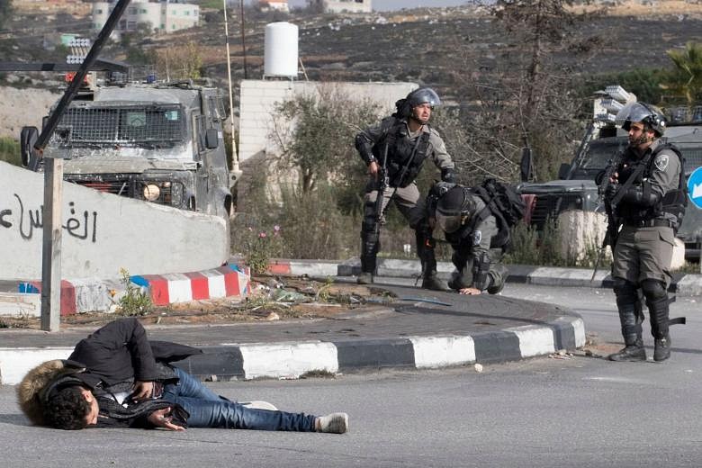 Palestinian In ‘suicide Vest’ Killed After Stabbing Israeli Police ...