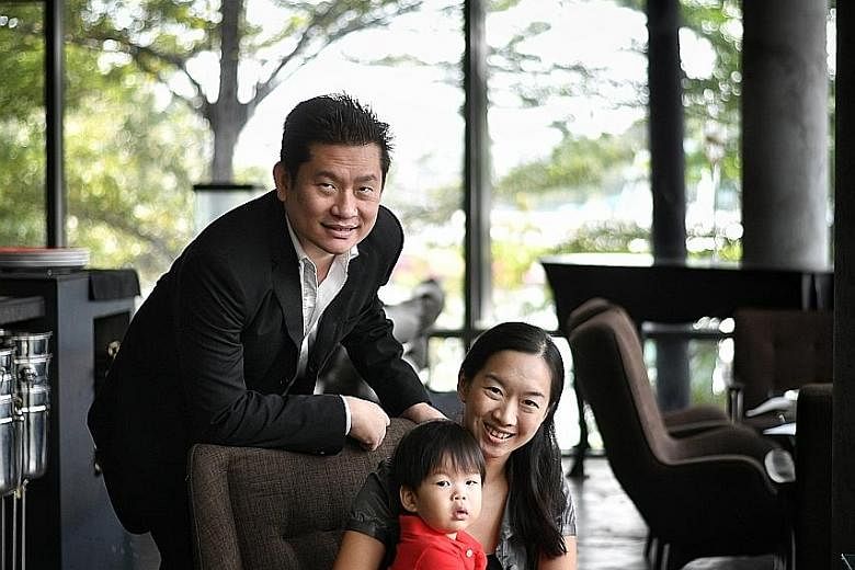 Mr Malcolm Tan, 43, with his wife Sharon Loh, 38, and two-year-old son Zendyll at Museo restaurant, one of his many businesses. His retirement plan involves working towards a personal net worth of $200 million, to be funded by capital gains from his 