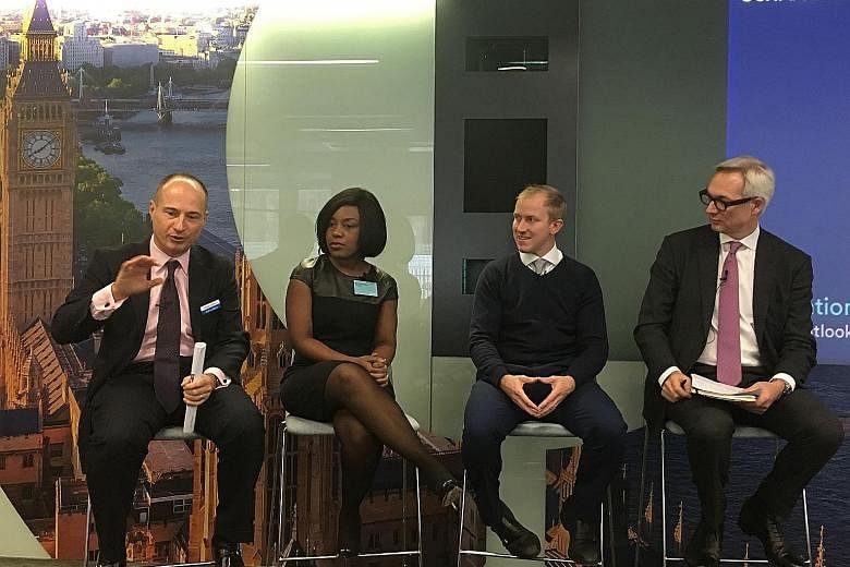 From left: Schroders fund managers Philippe Lespinard, co-head of fixed income; multi-asset fund manager Remi Olu-Pitan; and European equities fund manager James Sym at the Schroders International Media Conference 2017 in London last month.