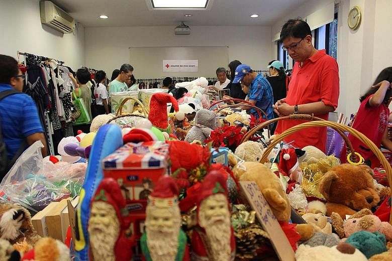 The Red Cross' year-end sale at its thrift shop in Penang Lane, which is open on Wednesdays from 11am to 4pm.