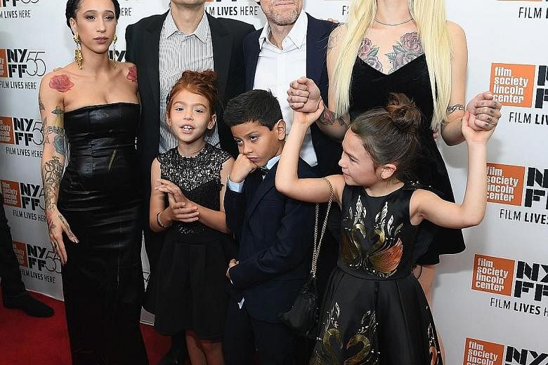 The Florida Project's director Sean Baker (second from left) with cast members (clockwise, from left) Mela Murder, Willem Dafoe, Bria Vinaite, Brooklynn Prince, Christopher Rivera and Valeria Cotto.