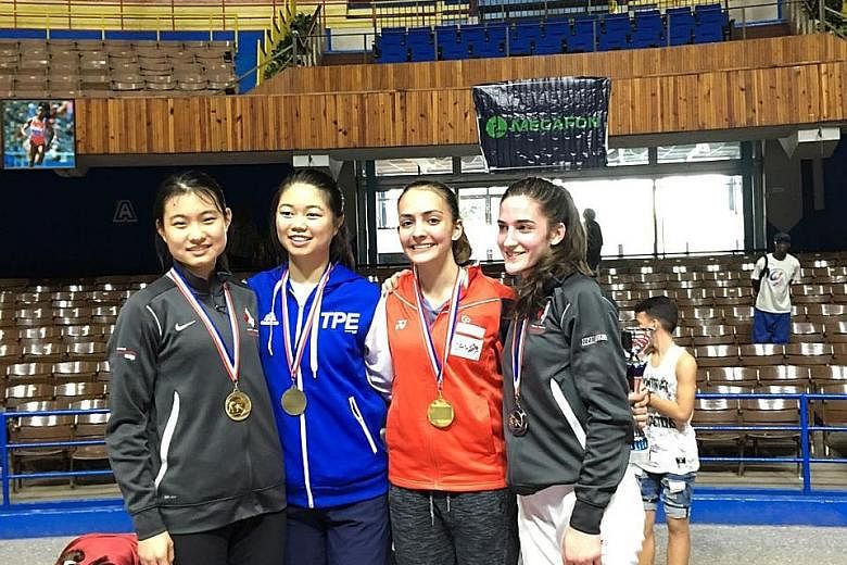 Fencer Amita Berthier (second from right) beat Canada's Naomi Moindrot-Zilliox (right) to win the Junior World Cup. Canada's Cao Ying (left) and Chinese Taipei's Tsai Xiao-qing were the semi-final losers.
