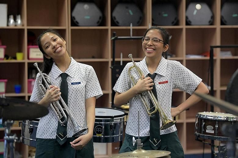 Twins Heevah (left) and Heerah Judd Mohamad Said scored Grade 1 in both mathematics and combined science in the GCE N levels. The 17-year-old sisters, who are in Normal (Academic), had jumped from Normal (Technical) at the end of Sec 2.