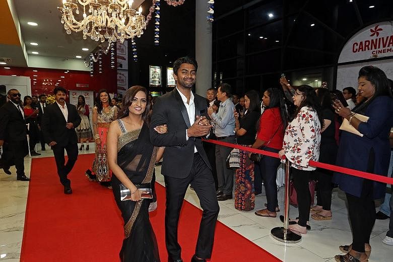 Abbas Akbar (left) with his wife Jaya Rathakrishnan at a preview of Chennai2Singapore in Singapore last month.