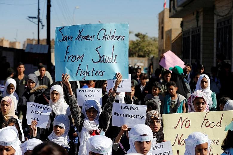 Children protesting against the Saudi-led coalition outside the UN offices in Sanaa, Yemen, last month.