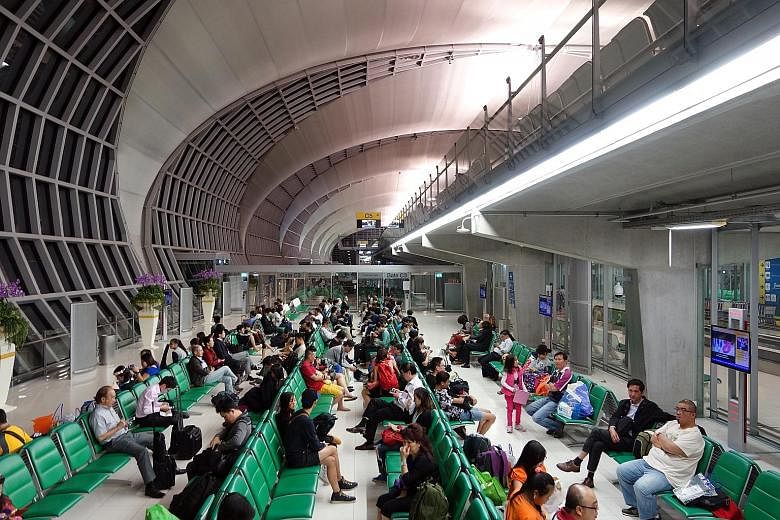 Suvarnabhumi airport (left) and Don Mueang airport are running at 40 per cent beyond designed capacity. New terminals, facilities and another runway would let them handle 130 million passengers a year. Facing a deluge of Chinese tourists that has str
