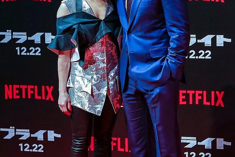 Bright cast members Noomi Rapace and Will Smith (both above) attend the Japan premiere for the film in Tokyo on Tuesday.