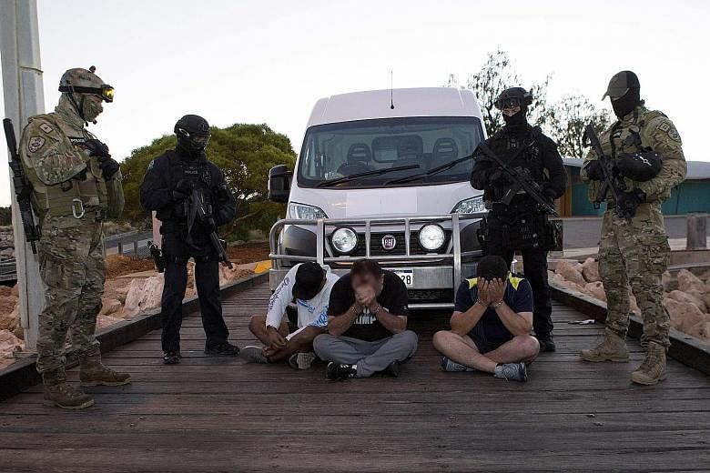 Police watching over suspects after 1.2 tonnes of "ice" in large sacks was seized after it was offloaded from a boat in Western Australia on Thursday.