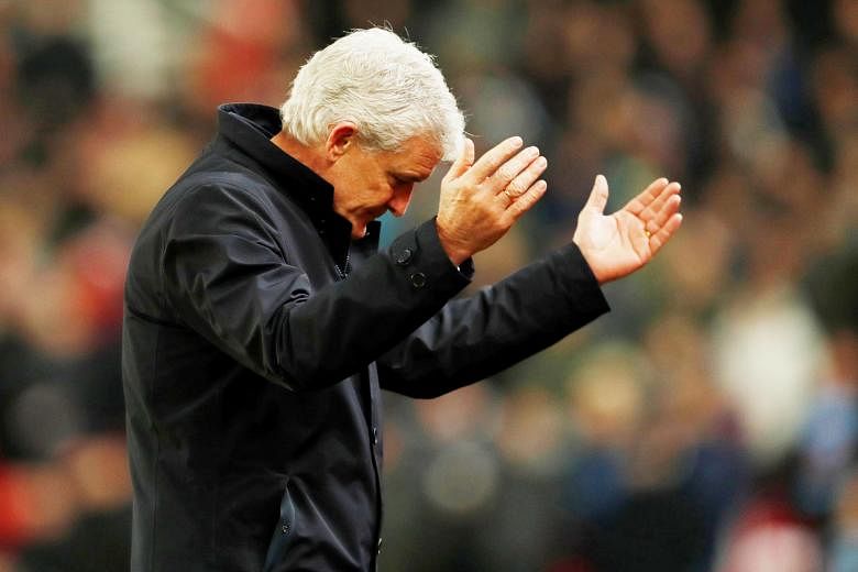 A frustrated Stoke manager Mark Hughes during the 0-3 home loss to West Ham last week. Their defensive record is especially bad, letting in more than two goals a game on average.