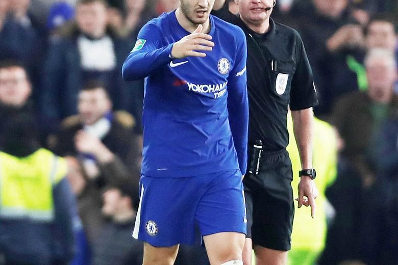 Referee Lee Mason showing Alvaro Morata the yellow card for kicking the ball away as Bournemouth attempted to restart the game quickly, after the Chelsea striker's stoppage-time goal in the Blues' 2-1 League Cup win in midweek.