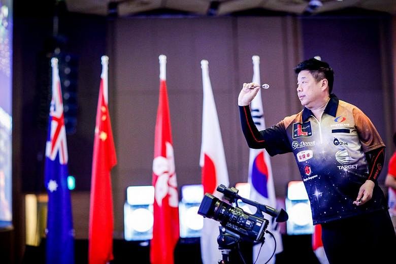 Singaporean Paul Lim's poor finishing cost him another historic nine-darter and the £20,000 (S$36,000) bonus that comes with it.