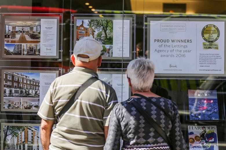 An elderly couple in London checking out property advertisements. An asset management strategist says Britons can forget about the fantasy of handing on the house to the children; those assets, if people were lucky enough to have them, would have to 