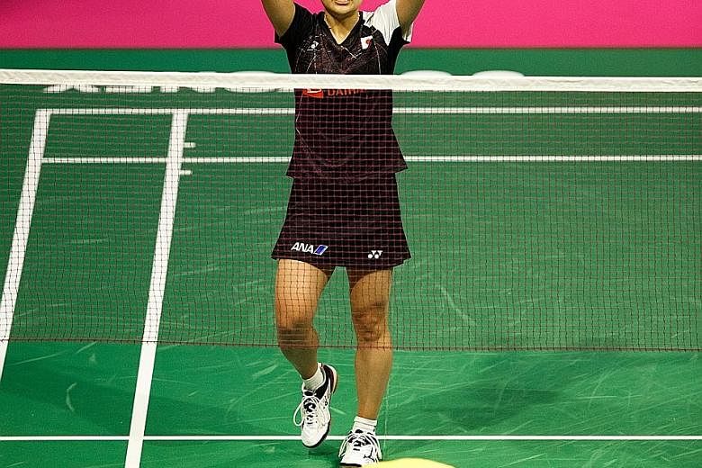 Japanese seventh seed Nozomi Okuhara saluting the crowd after winning her titanic battle against fourth seed P.V. Sindhu of India 21-19, 20-22, 22-20 at the BWF Badminton World Championships in Glasgow in August.