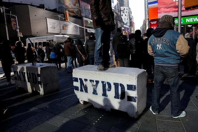 Bollards have been placed on sidewalks in Times Square as part of security moves against attacks by vehicles.
