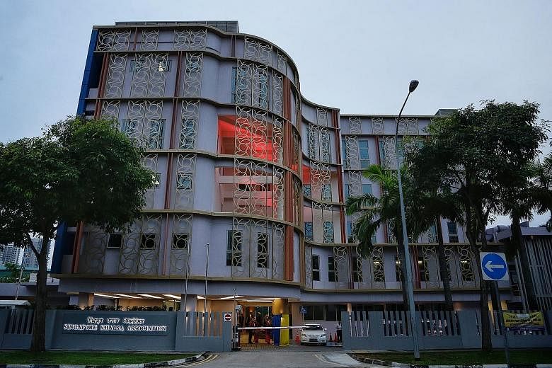 The facade (top) and rear view of the renovated Singapore Khalsa Association building after its $12 million makeover.