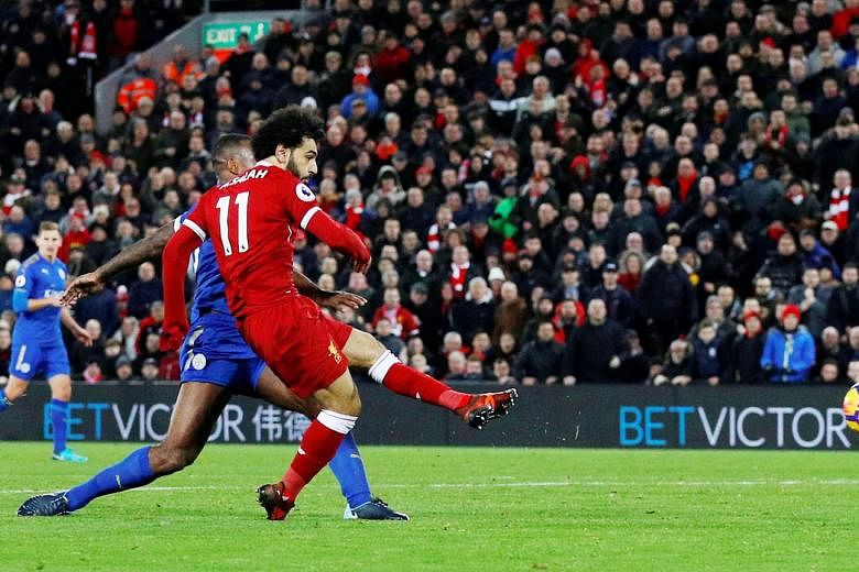 Mohamed Salah scoring the second of his pair of second-half goals as Liverpool came from behind to beat Leicester 2-1 in the Premier League. The visiting Foxes opened the scoring through Jamie Vardy in the third minute.