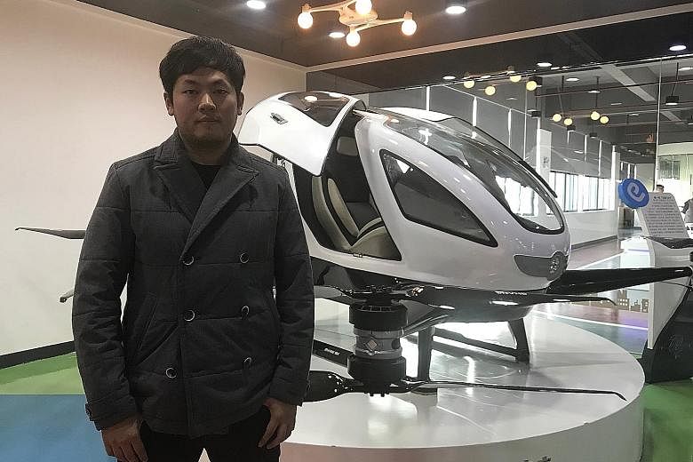 Mr Derrick Xiong with the Ehang 184, which has four battery-powered propellers and is equipped with fully automated navigation. It can fly for 20 to 30 minutes at a height of 300m to 500m.