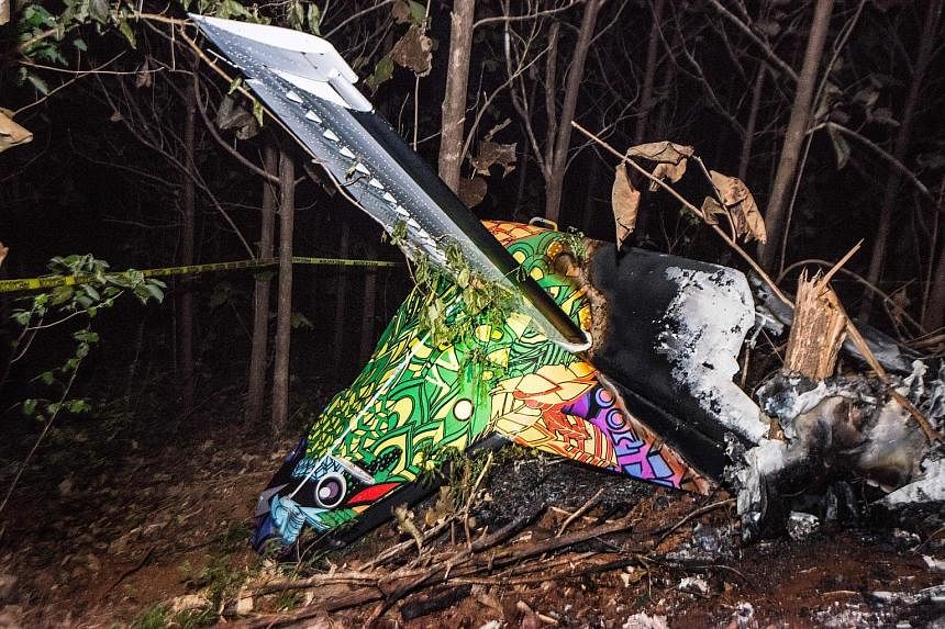 The wreckage of the plane that crashed in Guanacaste, Costa Rica, on Sunday. All 10 passengers and the two pilots were killed.