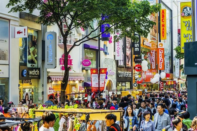 Myeongdong gained prominence as a shopping hub with the opening of South Korea's first department store there in the 1930s. By the 1970s, it had become a premier shopping destination drawing the trendiest youth.
