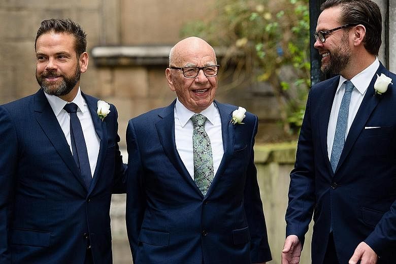 Mr Rupert Murdoch wants his elder son Lachlan (left, also seen with younger brother James) to be chief executive officer of New Fox.