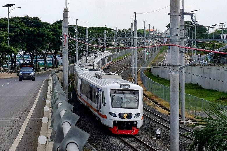 A train travelling between Jakarta's Soekarno-Hatta International Airport and the city centre. Padang, Palembang and Surakarta will also get airport trains this year.