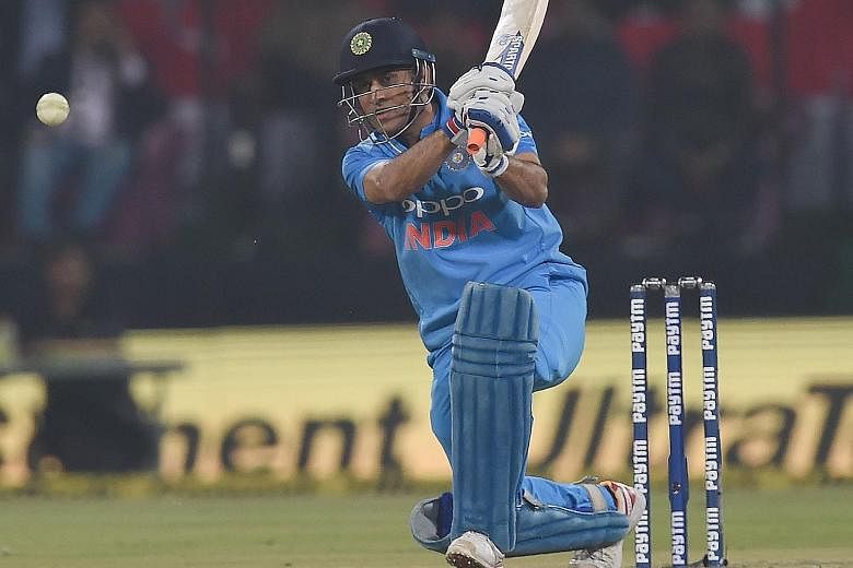 M.S. Dhoni playing a shot during the second T20 International against Sri Lanka in Indore on Dec 22, scoring 28 runs in India's 88-run victory. The 36-year-old is one of the most high-profile cricketers.