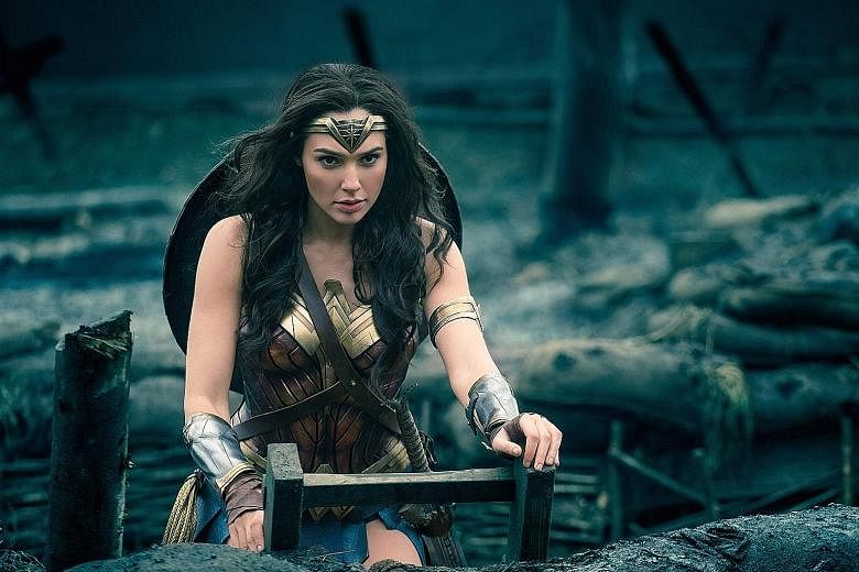 Even though critically lauded movies such as Wonder Woman (above) were directed by women, Hollywood is still dominated by white men.