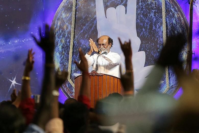 Mr Rajinikanth with his supporters in Chennai after stating he will start a political party. The one-time bus conductor, who has acted in over 200 films, hopes to give voters an alternative to the established parties in Tamil Nadu.