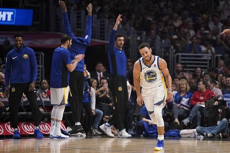 Golden State Warriors guard Stephen Curry celebrating after one of his eight three-pointers against the Los Angeles Clippers at Staples Centre on Saturday. He made a career-high 15 of 16 free-throws for a season-high 45 points.