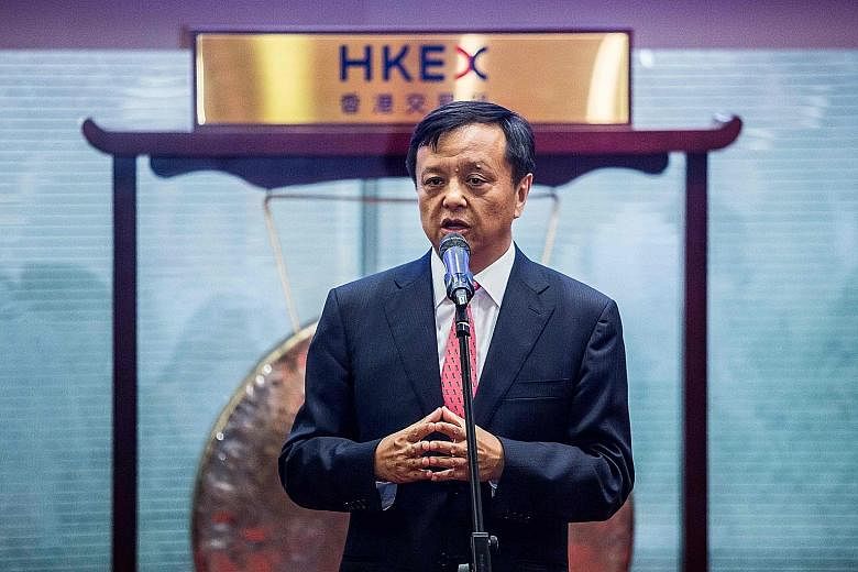 HKEX CEO Charles Li, seen here speaking at an event to mark the end of floor trading at the Hong Kong Stock Exchange on Oct 27 last year, said the exchange operator is considering whether to ask the government to reduce or remove stamp duty, but it d