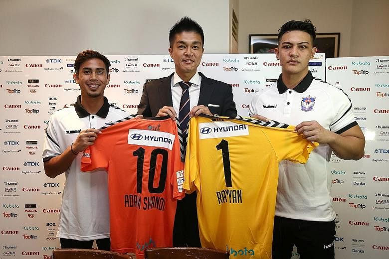 Albirex Niigata chairman Daisuke Korenaga welcoming attacking midfielder Adam Swandi and goalkeeper Shahul Rayyan.