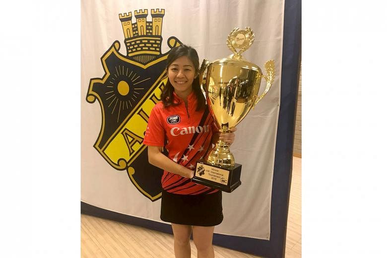 Singapore bowler Bernice Lim with the AIK International trophy. She beat top seed Jesper Svensson 240-233 with an eight-pin women's handicap in the step-ladder finals on Sunday.