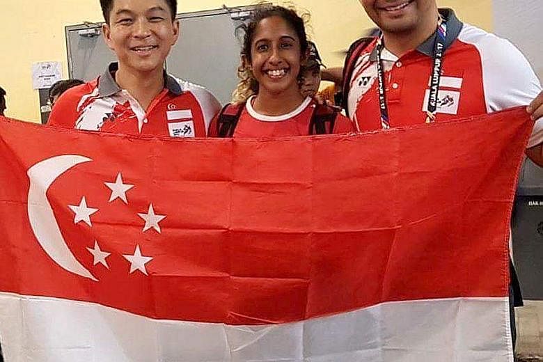 Former national water polo vice-captain Yip Renkai (right) with SNOC president Tan Chuan-Jin and national sprinter Shanti Pereira at the Kuala Lumpur SEA Games in August. Yip says "the call to connect and help local sports" was a key reason he accept