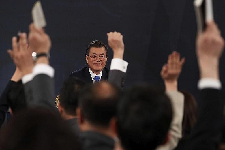 South Korean President Moon Jae In during the New Year's press conference at the Presidential Blue House in Seoul yesterday. He pledged to remain committed to "people-centred" economic growth.