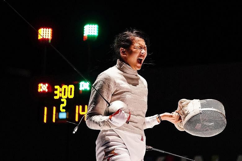 Lau Ywen letting off a victory cry after beating Vietnam's Bui Thi Thu Ha in the individual sabre semi-finals at the SEA Games in Kuala Lumpur last August. She went one better by overcoming Thailand's Pornsawan Ngernrungruangroj in the final.