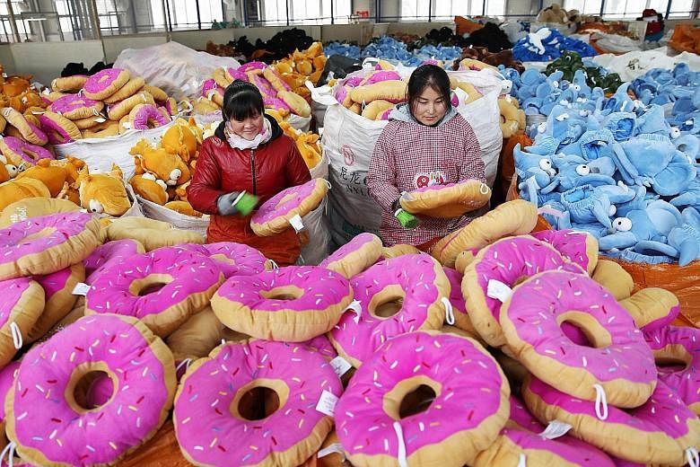 A toy factory in China. The World Bank says activity in East Asia will likely moderate as China transitions to slower but more sustainable growth.