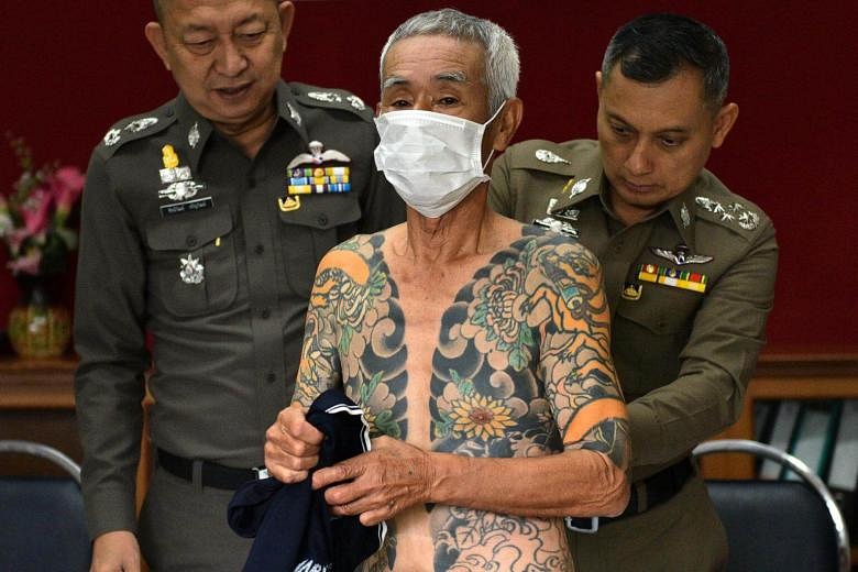 Fugitive from Japanese yakuza gang is given away by tattoos