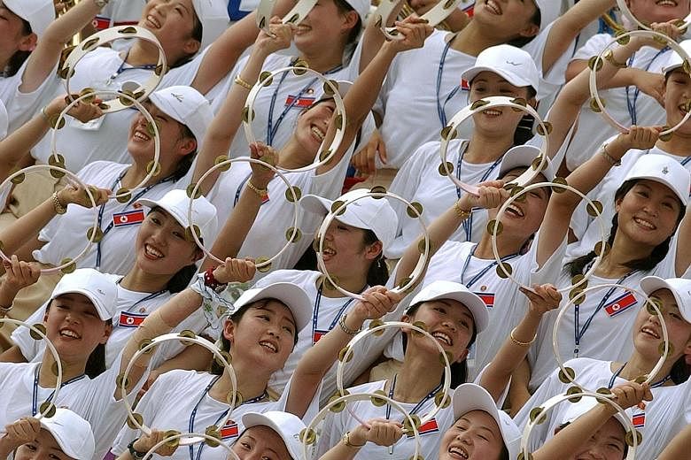 North Korea's female cheerleaders are cherry-picked by the regime based on tough criteria - they must be more than 163cm tall and come from "good" families.