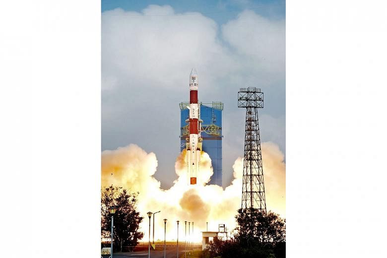 The Indian Space Research Organisation's Polar Satellite Launch Vehicle lifting off from Sriharikota in southern Andhra Pradesh state yesterday.