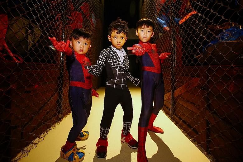 It was an amazing fantasy for "Spider-Boys" Azel Mohamed Zuraidi, four, (centre) and brothers Louie Teo (left), four, and Leroy Teo, eight, at Madame Tussauds Singapore, as they got to be the famed superhero for a day. The three boys were part of an 