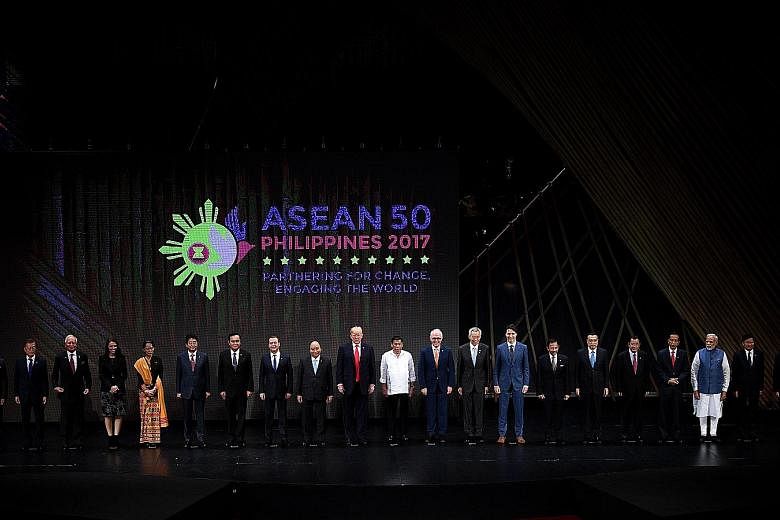 Asean delegates, world leaders and officials at the opening of the 31st Asean Summit in Manila on Nov 13. As chair of the grouping this year, Singapore has a plethora of plans, including getting Asean to work together to get tough on terrorism and cybercr