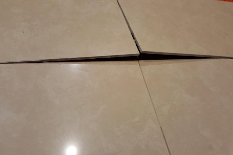 Reports of tiles popping and cracking in flats across Singapore; HDB