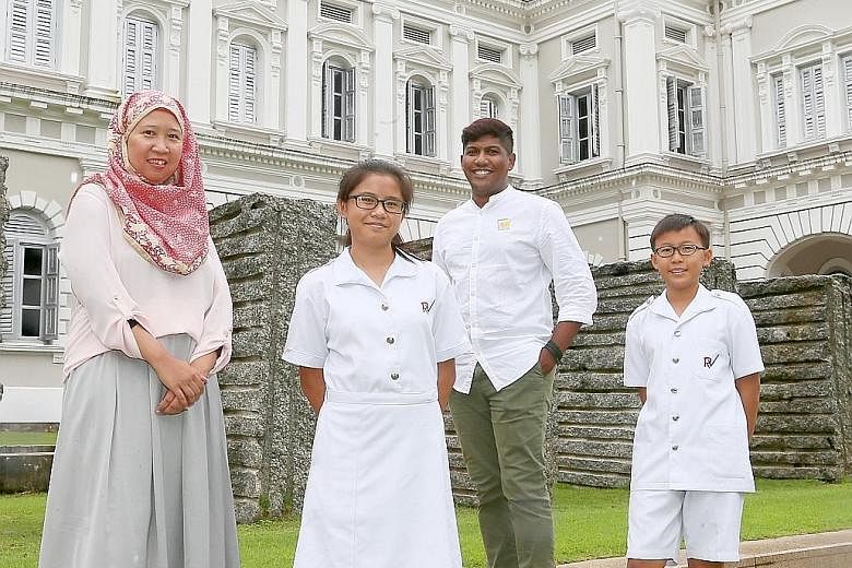 The National Heritage Board's volunteer guides include Ms Fistri Abdul Rahim, 43, who works in sales and marketing; civil servant Lionel Louis, 33; and River Valley High Schoolstudents Yong Kai Qing (second from left) and Lim Yan Zhe, both 14. There 