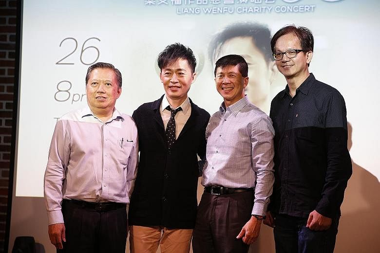 Singer-songwriter Liang Wern Fook (second from left) with (from left) Public Free Clinic Society president Seow Ser Fatt, HCA Hospice Care president Tan Poh Kiang and Ocean Butterflies Music managing director Colin Goh at a press conference yesterday