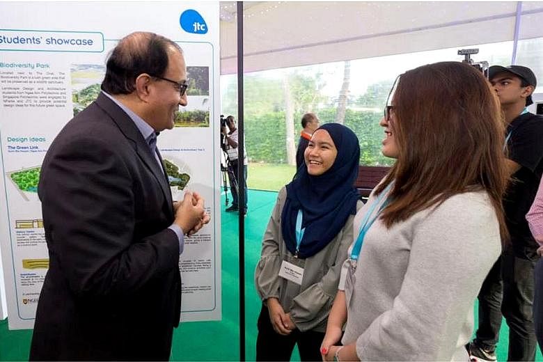 Minister for Trade and Industry (Industry) S. Iswaran (top) with Ngee Ann Polytechnic students who contributed ideas and concepts for the upcoming Biodiversity Park at Seletar Aerospace Park. (Above) Details about the aerospace industry transformatio