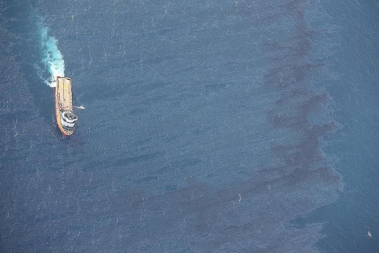 A Chinese rescue ship working to clean up oil slicks from the sunken tanker Sanchi this week in the East China Sea, following the worst oil ship disaster for decades.