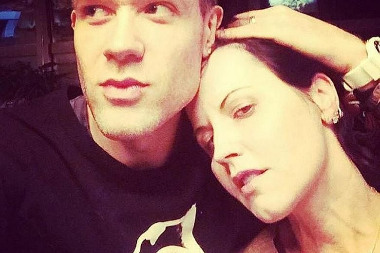 The Cranberries frontman Dolores O'Riordan in a New Year's Eve photo with her partner, New York-based musician Ole Koretsky.